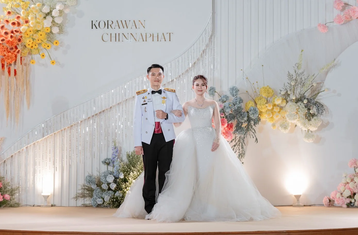 Couple portrait with the groom in military uniform at the Koko & Raam celebration in Chonburi