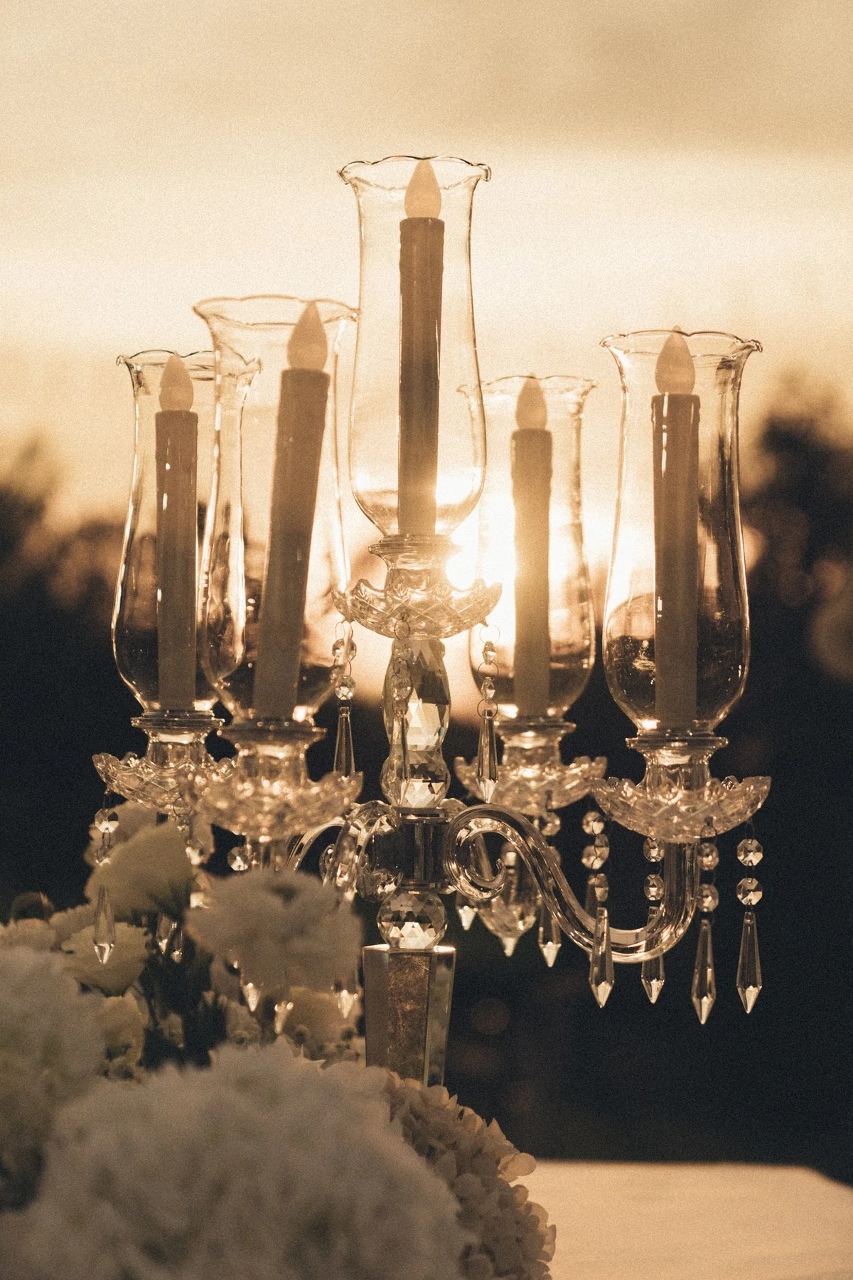 Crystal candlelight table detail at the Mook — Christmas Wedding celebration in Lopburi