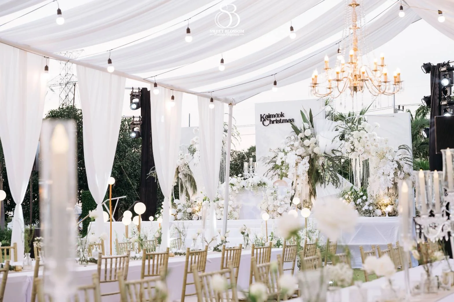 White marquee reception interior at the Mook — Christmas Wedding celebration in Lopburi